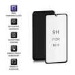 Kép 3/6 - Qoltec edzett üveg kijelzővédő Xiaomi Mi9-hez fekete színben