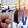 Kép 5/6 - Qoltec fekete önzáró kábelkötegelő 4.8x200mm